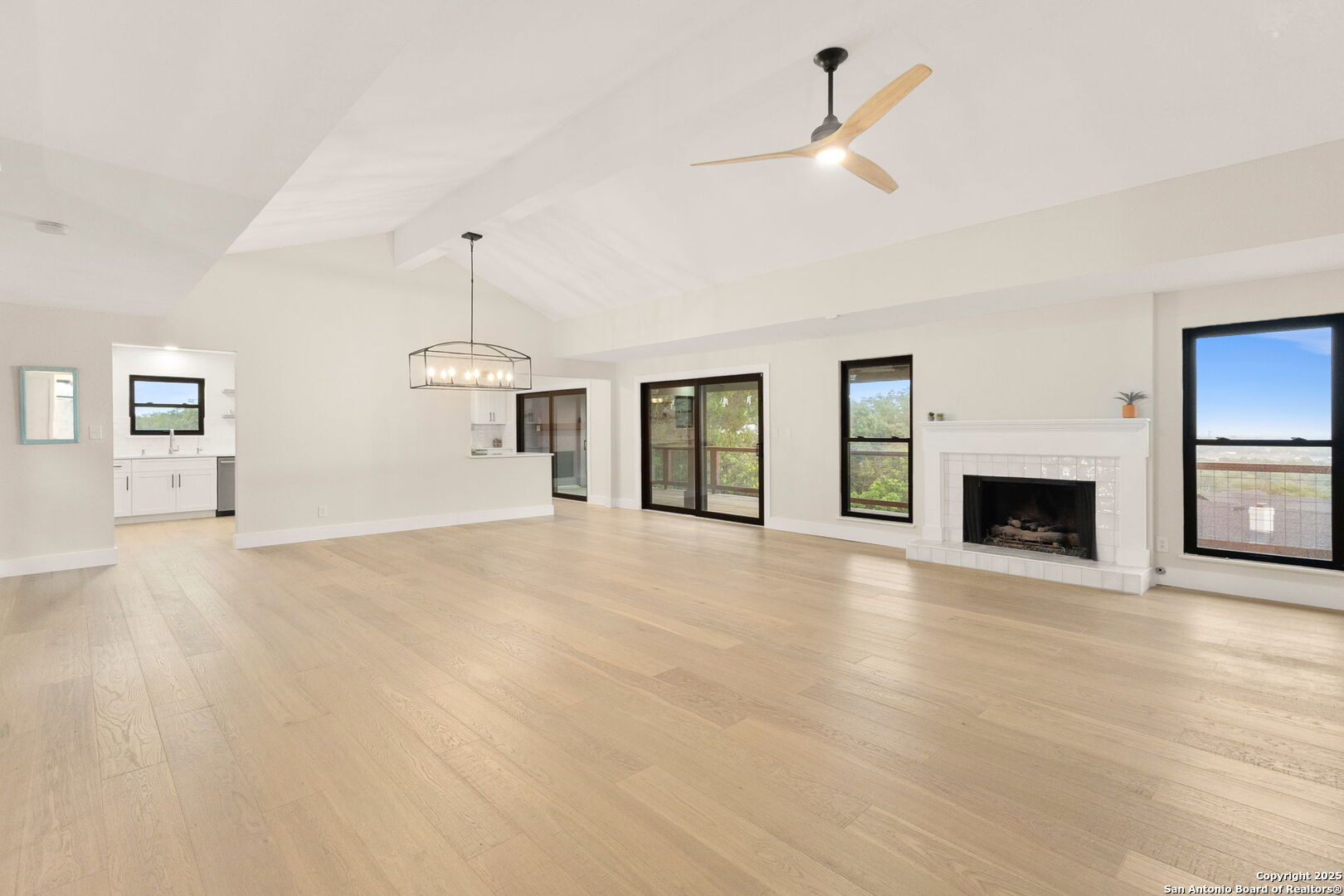 835 Fredericksburg Road New Braunfels, TX 78130 - Photo 13 of 56 a view of an empty room with window and fireplace