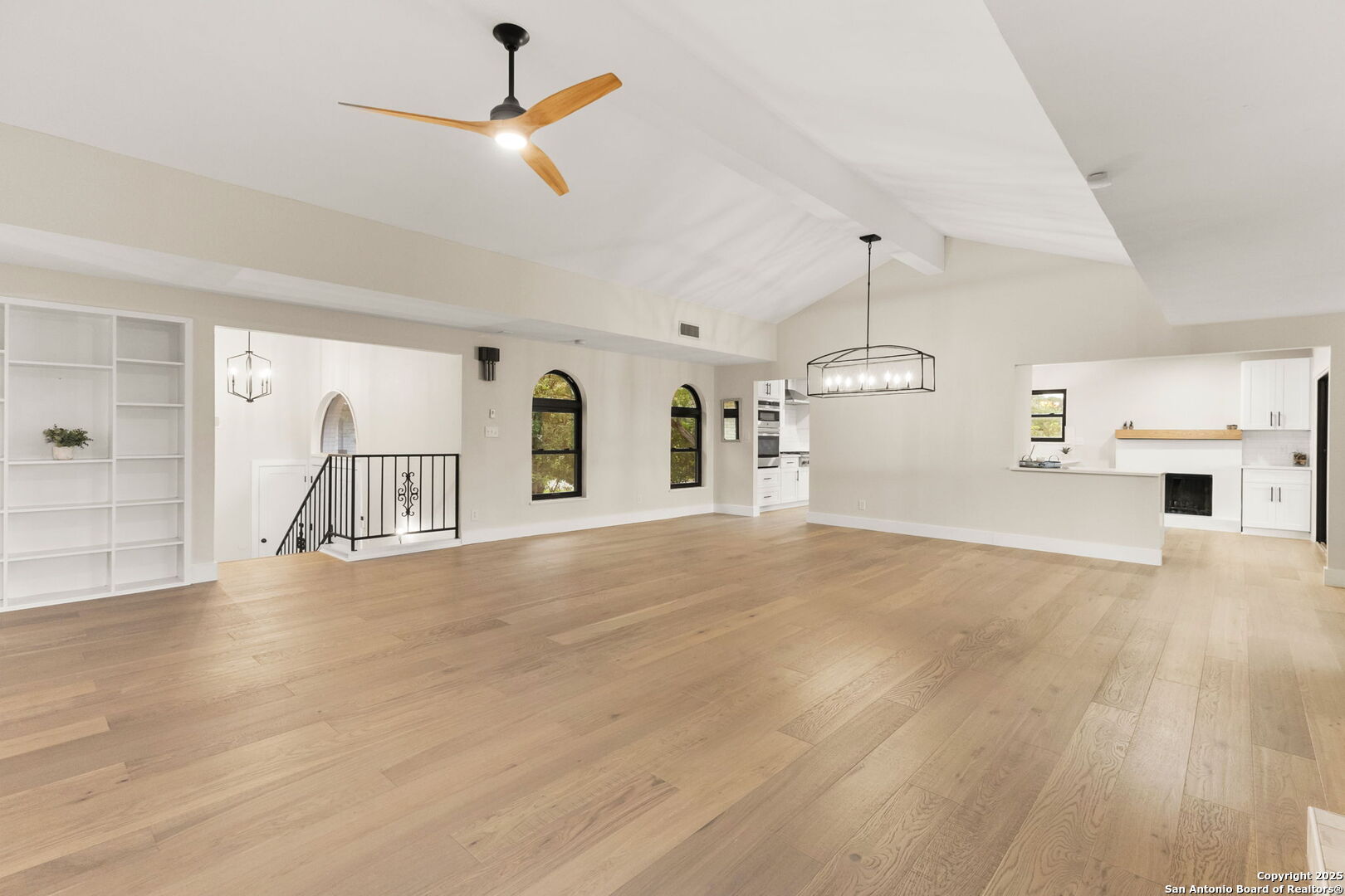 835 Fredericksburg Road New Braunfels, TX 78130 - Photo 14 of 56 a view of a kitchen with a sink and a fireplace