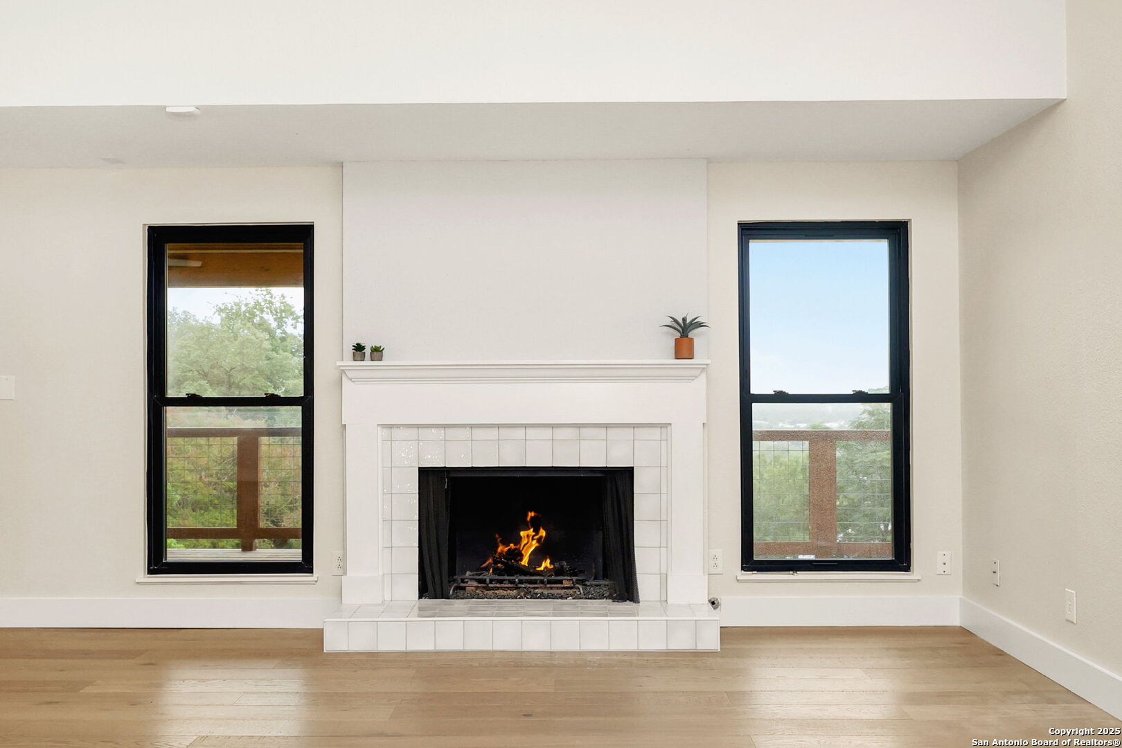 835 Fredericksburg Road New Braunfels, TX 78130 - Photo 15 of 56 a view of a livingroom with a fireplace and window