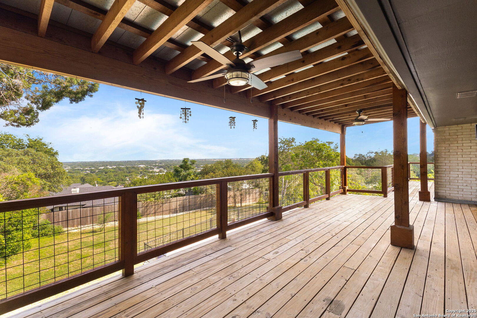 835 Fredericksburg Road New Braunfels, TX 78130 - Photo 24 of 56 a view of balcony with wooden floor