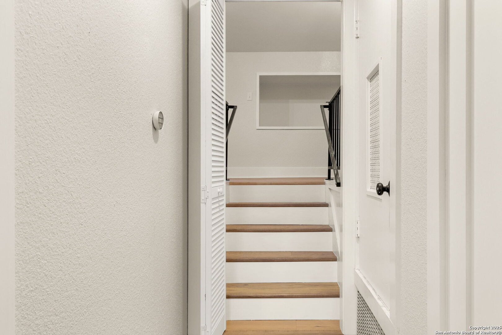 835 Fredericksburg Road New Braunfels, TX 78130 - Photo 29 of 56 a view of staircase with white walls