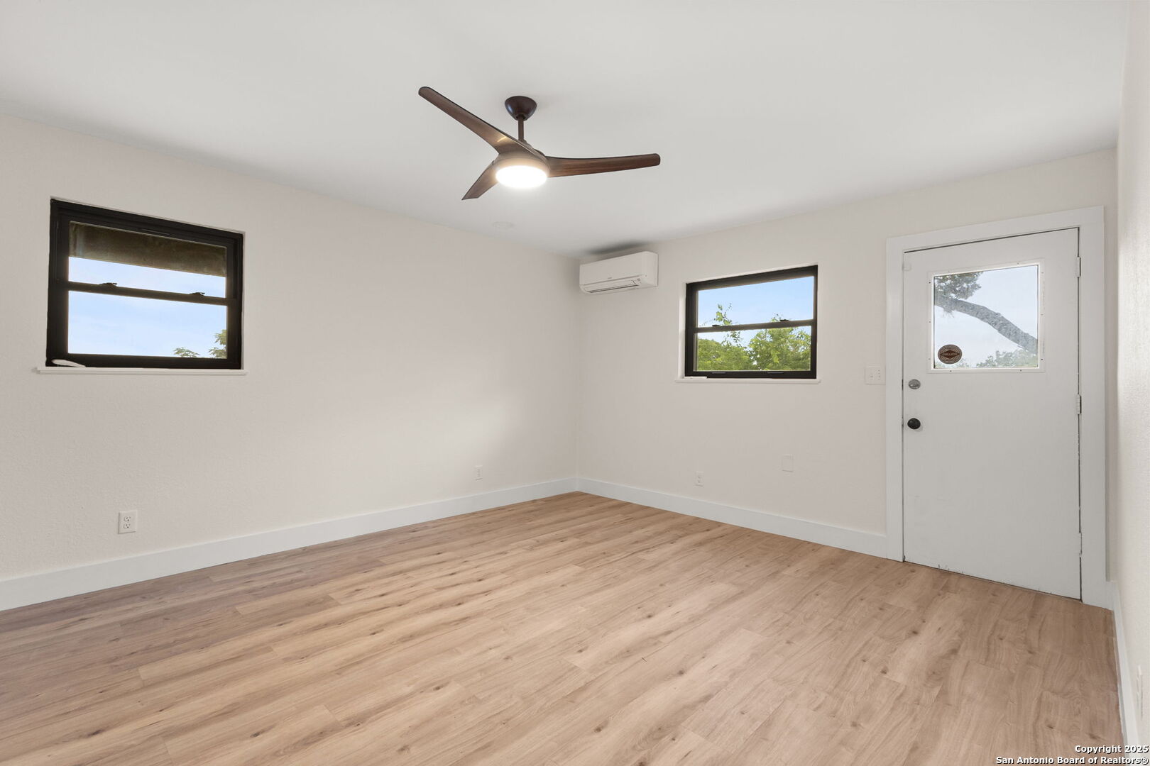 835 Fredericksburg Road New Braunfels, TX 78130 - Photo 40 of 56 a view of empty room with wooden floor