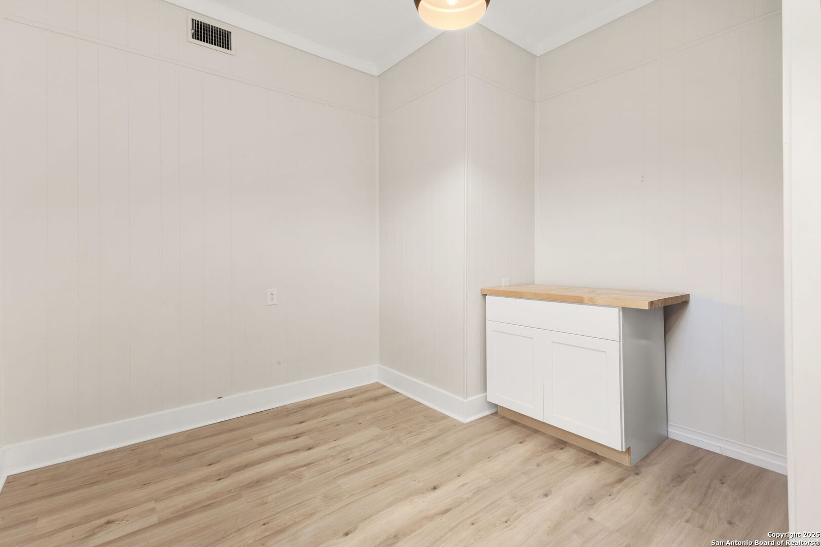 835 Fredericksburg Road New Braunfels, TX 78130 - Photo 42 of 56 an empty room with wooden floor