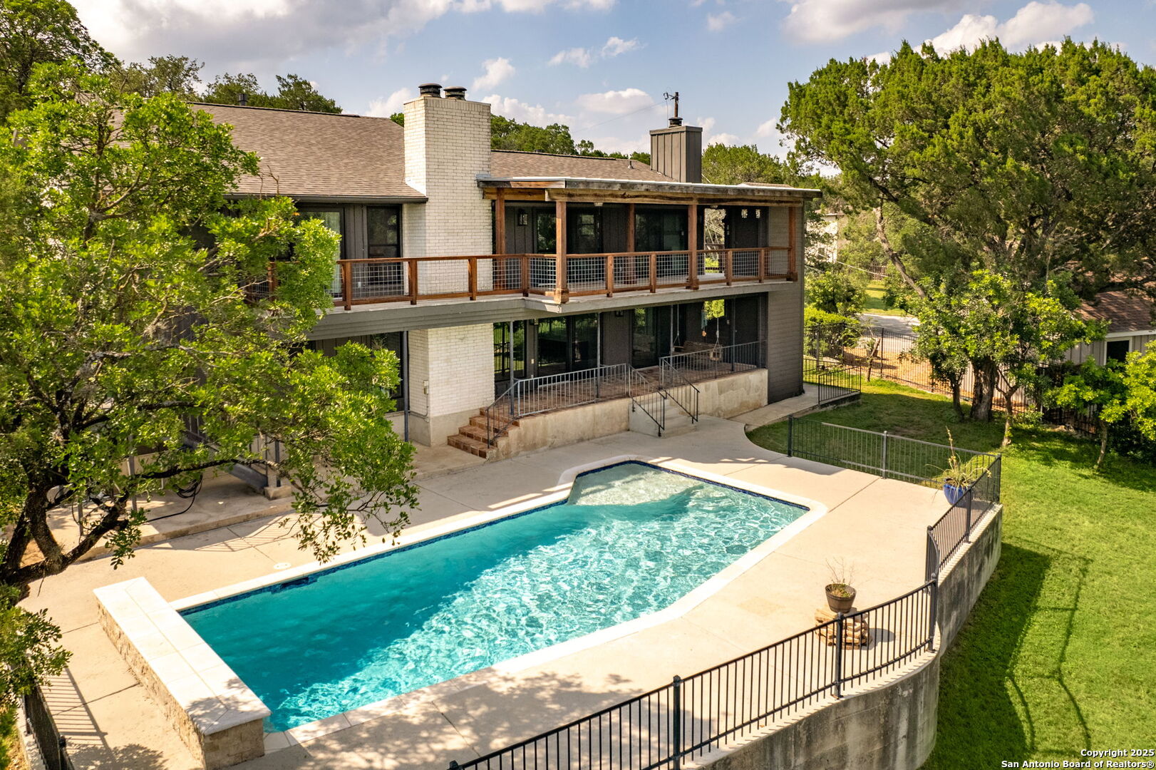 835 Fredericksburg Road New Braunfels, TX 78130 - Photo 51 of 56 aerial view of a house with a yard