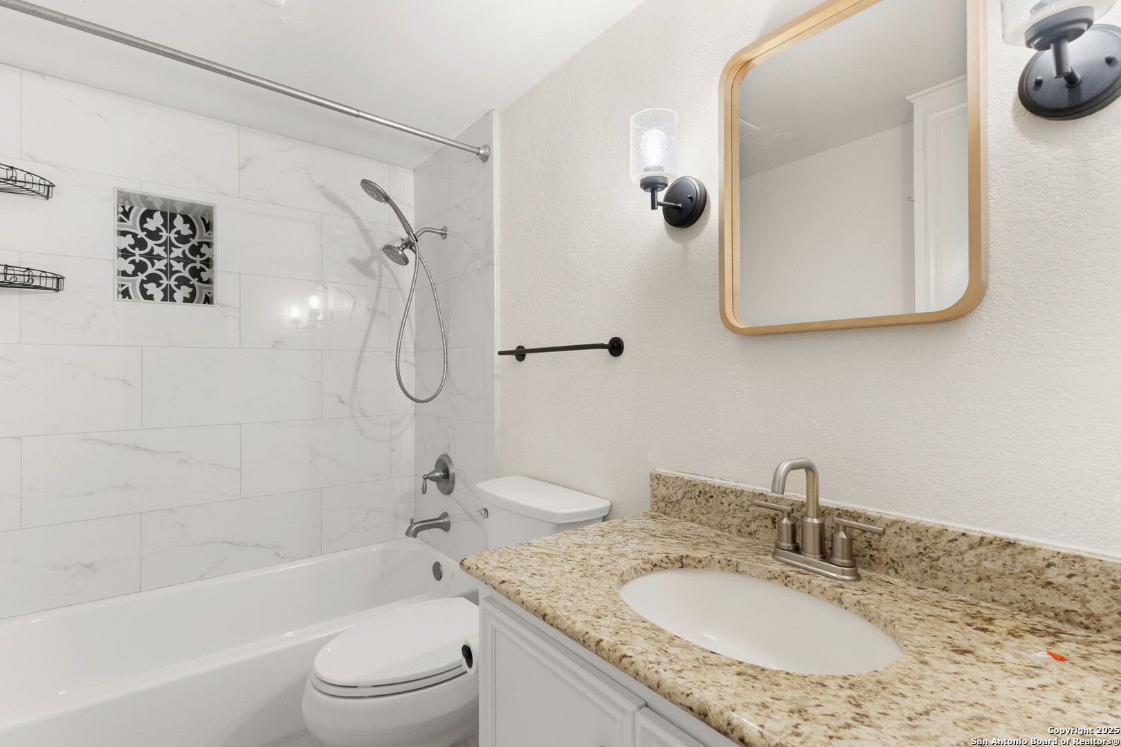 835 Fredericksburg Road New Braunfels, TX 78130 - Photo 10 of 56 a bathroom with a granite countertop sink a toilet and shower
