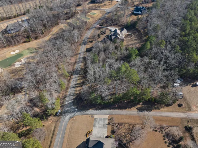 a view of a road with a yard