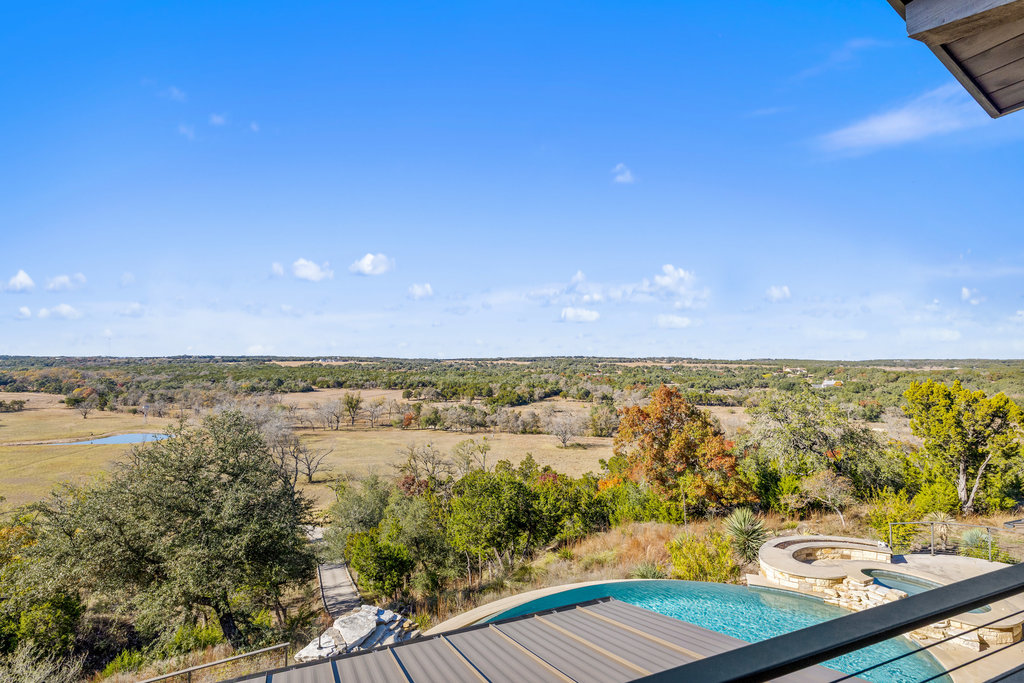 3550 Bell Springs Road Dripping Springs, TX 78620 - Photo 32 of 40 Relaxing pool / spa with a water view