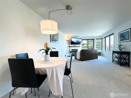 a living room with furniture and a table