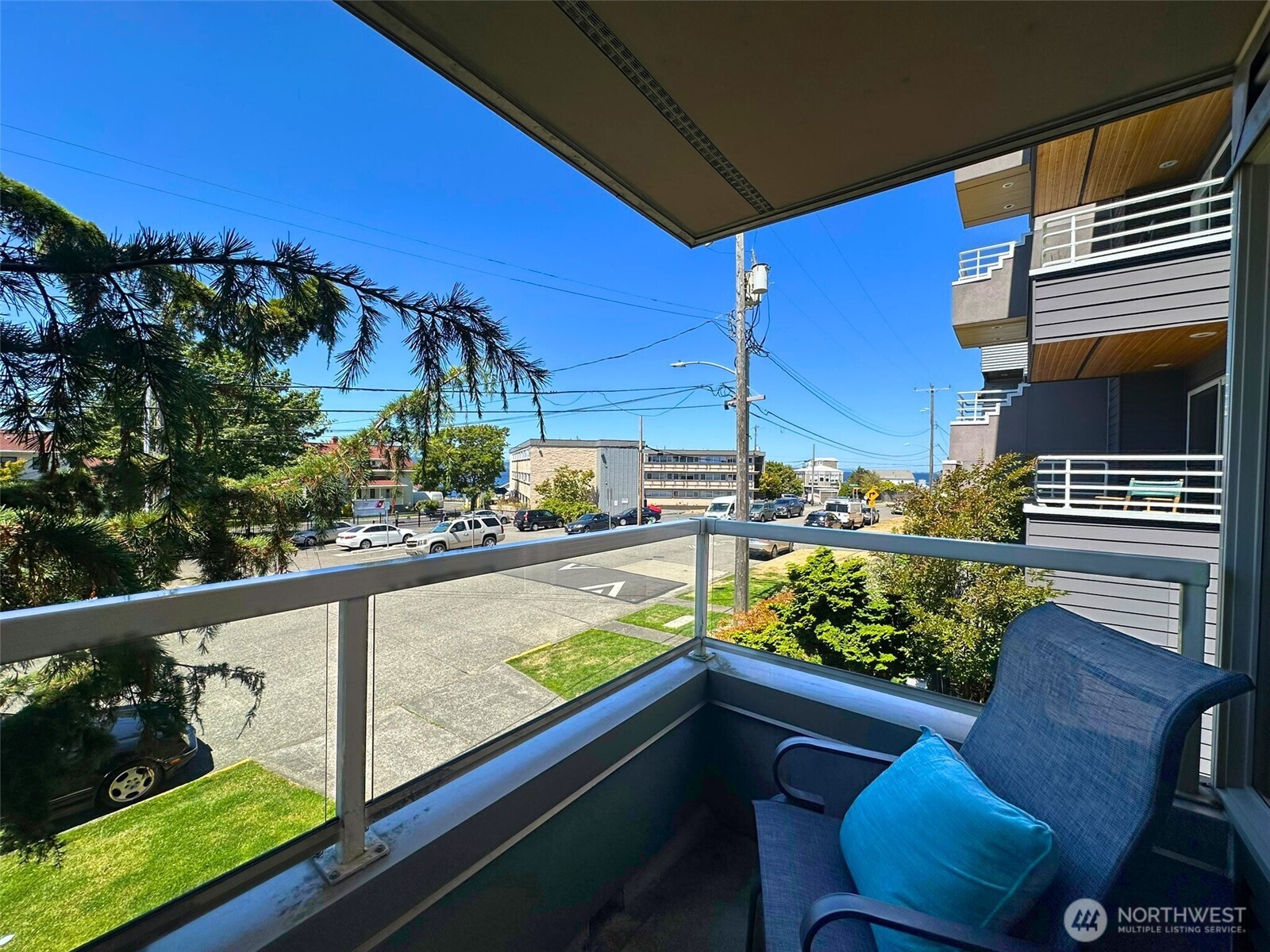 3204 Alki Avenue Southwest, Unit 1 Seattle, WA 98116 - Photo 2 of 35 a view of a two chairs in the balcony