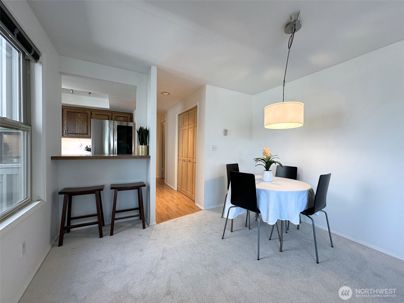 3204 Alki Avenue Southwest, Unit 1 Seattle, WA 98116 - Photo 10 of 35 a view of a dining room with furniture