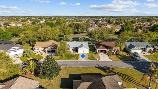 an aerial view of a house with a ocean view