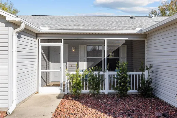 a view of a chairs and table in a room