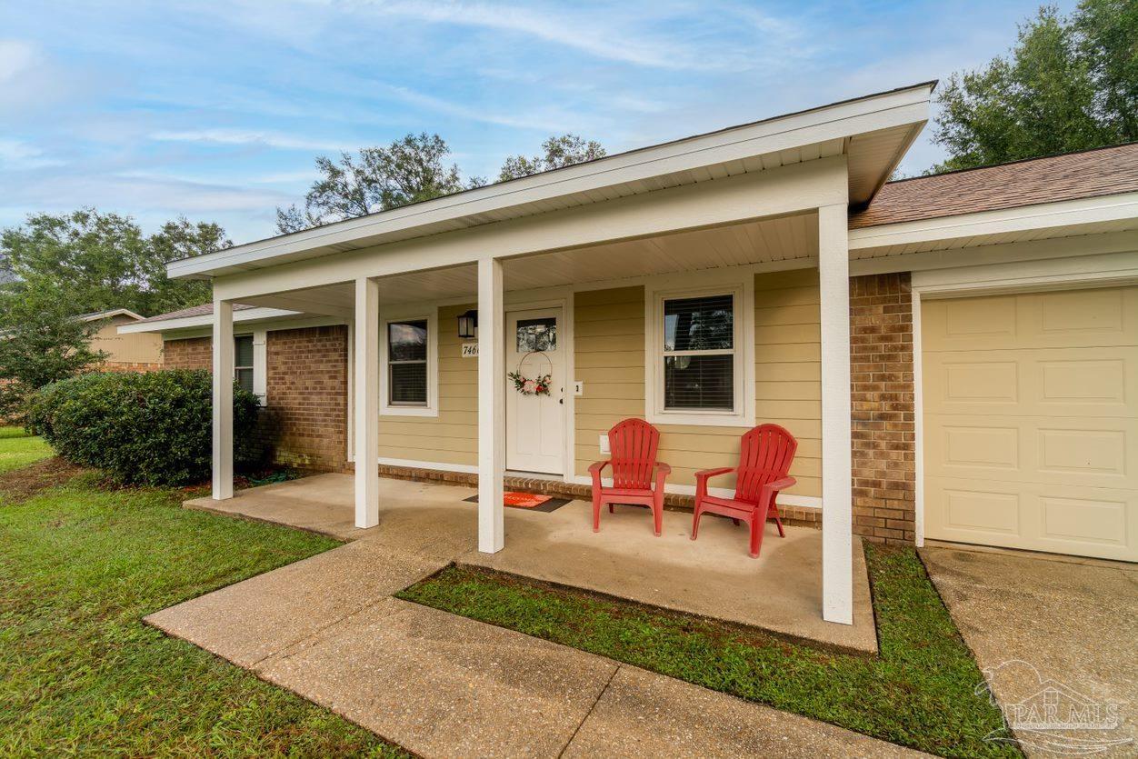 7466 Woodside Road Pensacola, FL 32526 - Photo 2 of 32 Cozy and roomy front porch