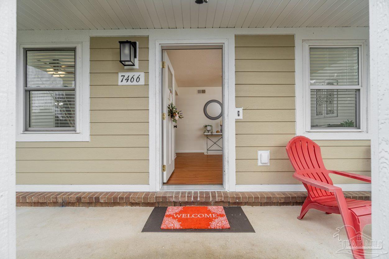 7466 Woodside Road Pensacola, FL 32526 - Photo 3 of 32 Beautifully updated white front door