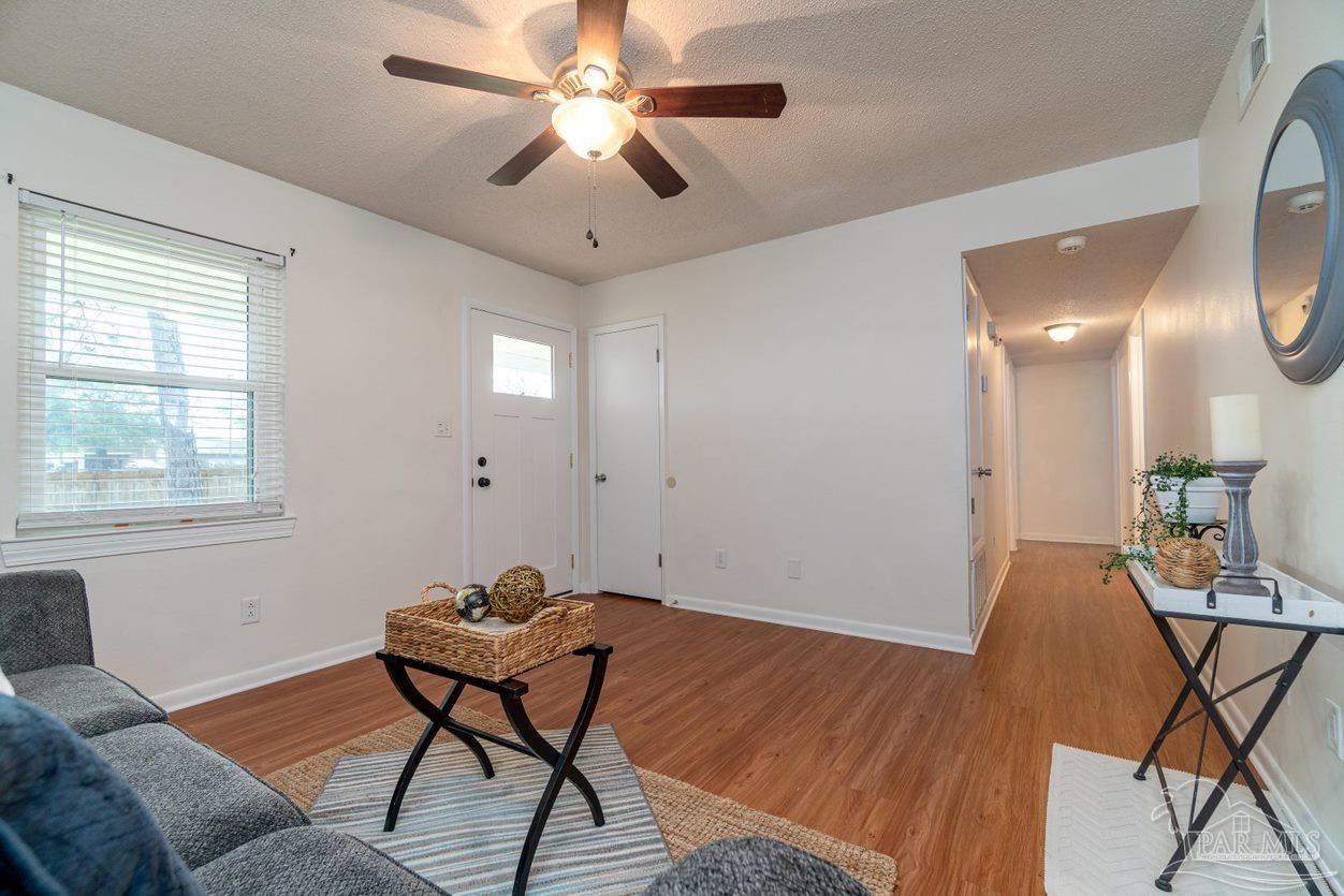7466 Woodside Road Pensacola, FL 32526 - Photo 6 of 32 An abundance of natural light