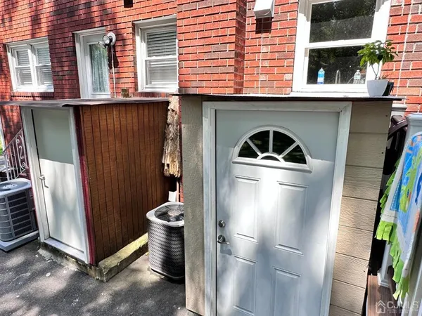 a view of a car park in front of a building