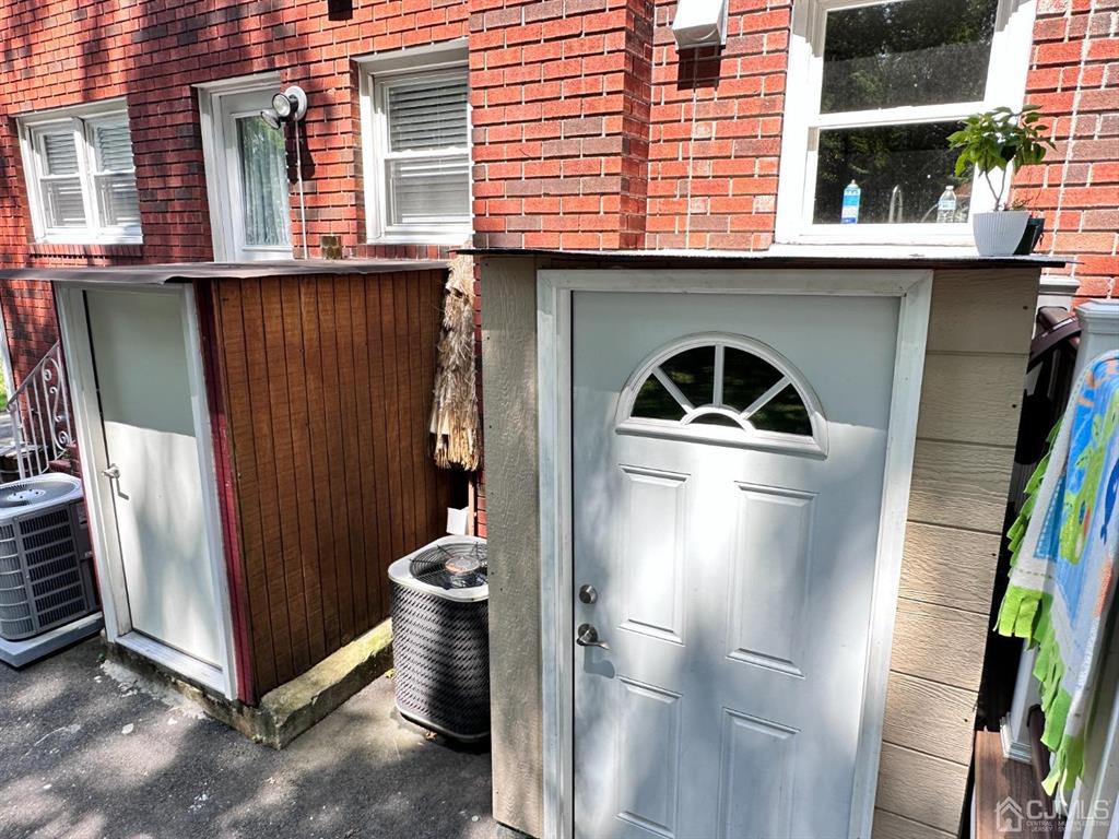 1722 Holly Road North Brunswick, NJ 08902 - Photo 18 of 22 a view of a car park in front of a building