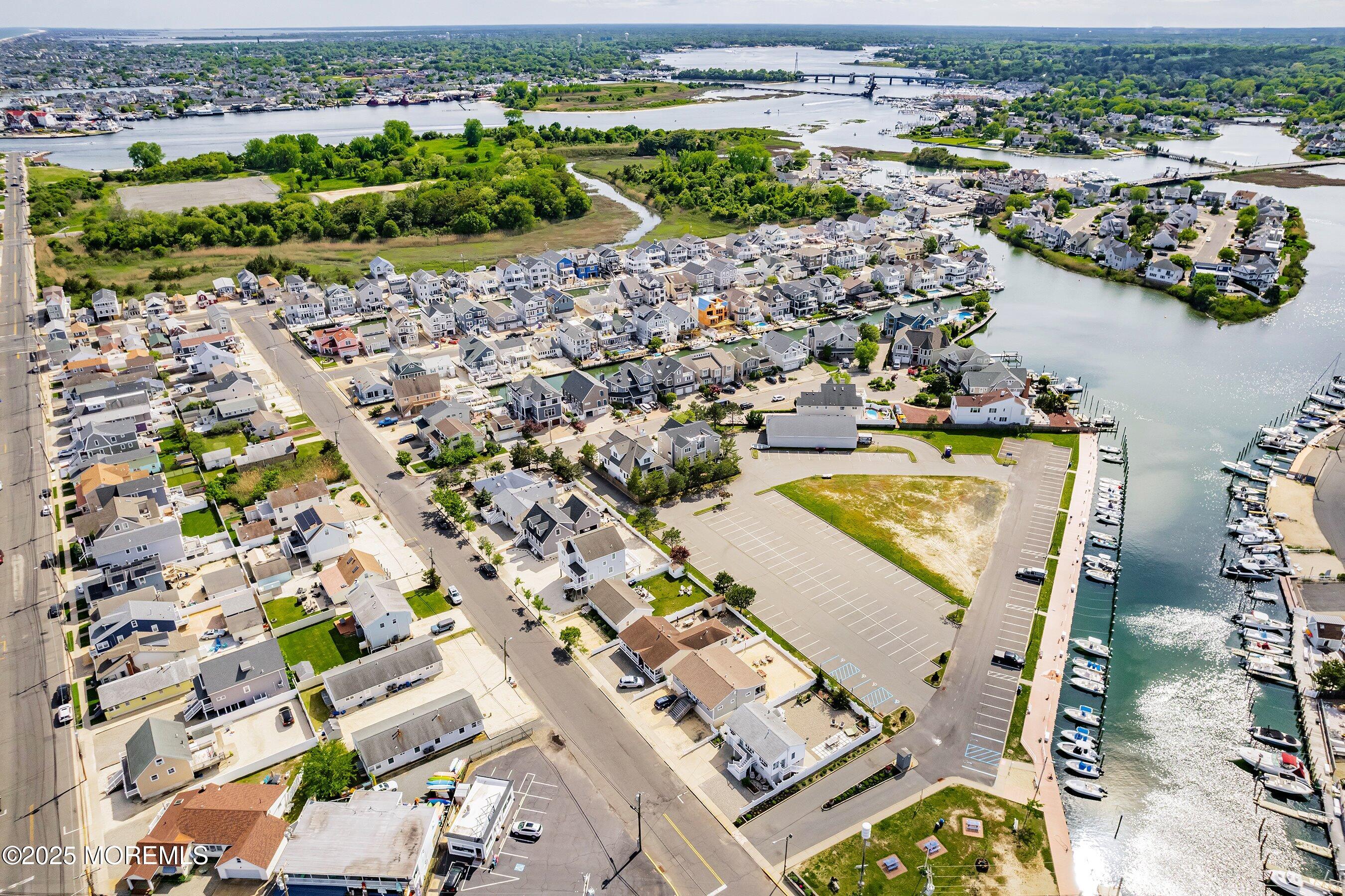 167 4th Avenue Manasquan, NJ 08736 - Photo 27 of 54 an aerial view of a city with lake view