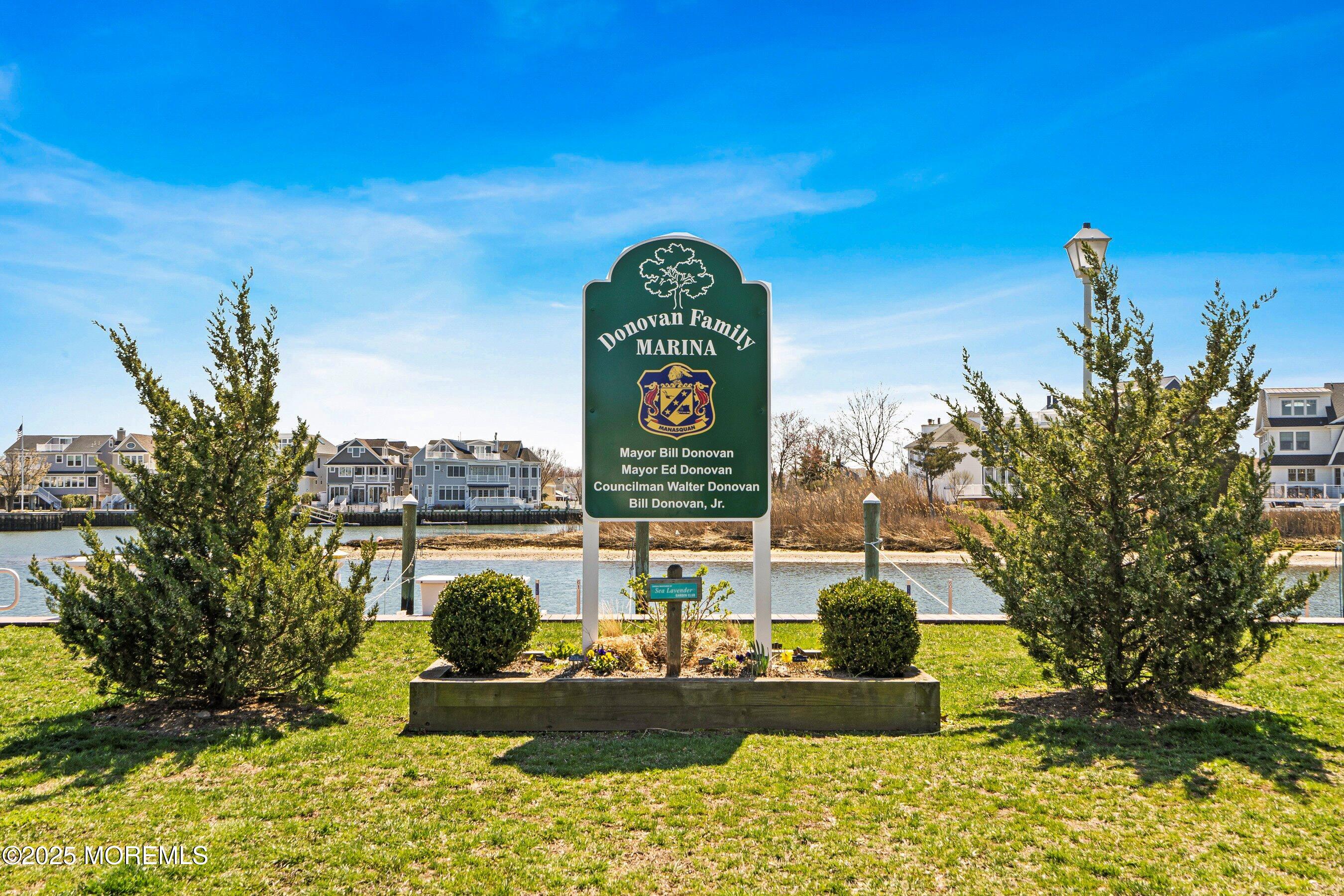 167 4th Avenue Manasquan, NJ 08736 - Photo 38 of 54 a view of swimming pool with a garden and plants