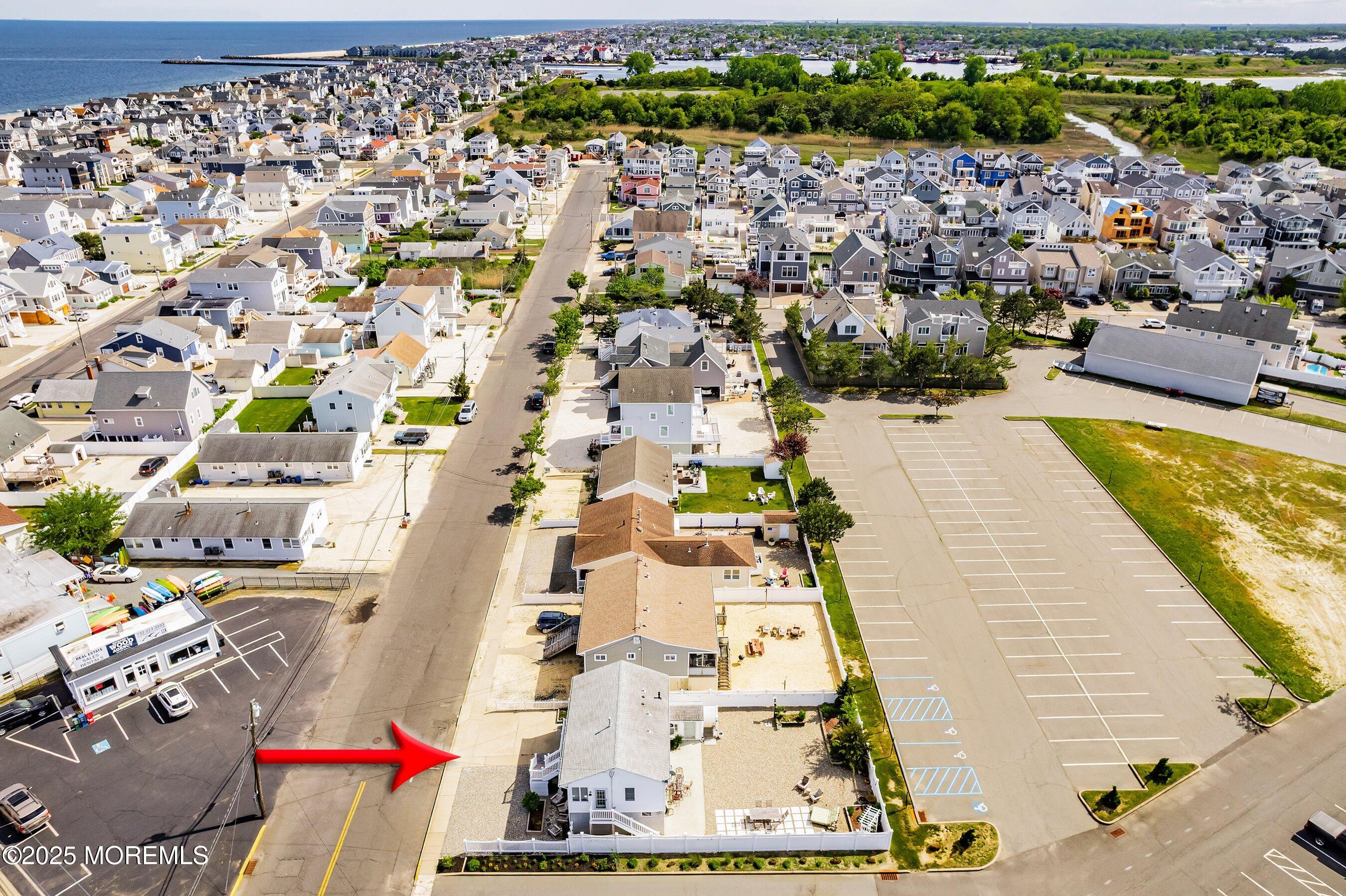 167 4th Avenue Manasquan, NJ 08736 - Photo 53 of 54 an aerial view of residential houses with outdoor space
