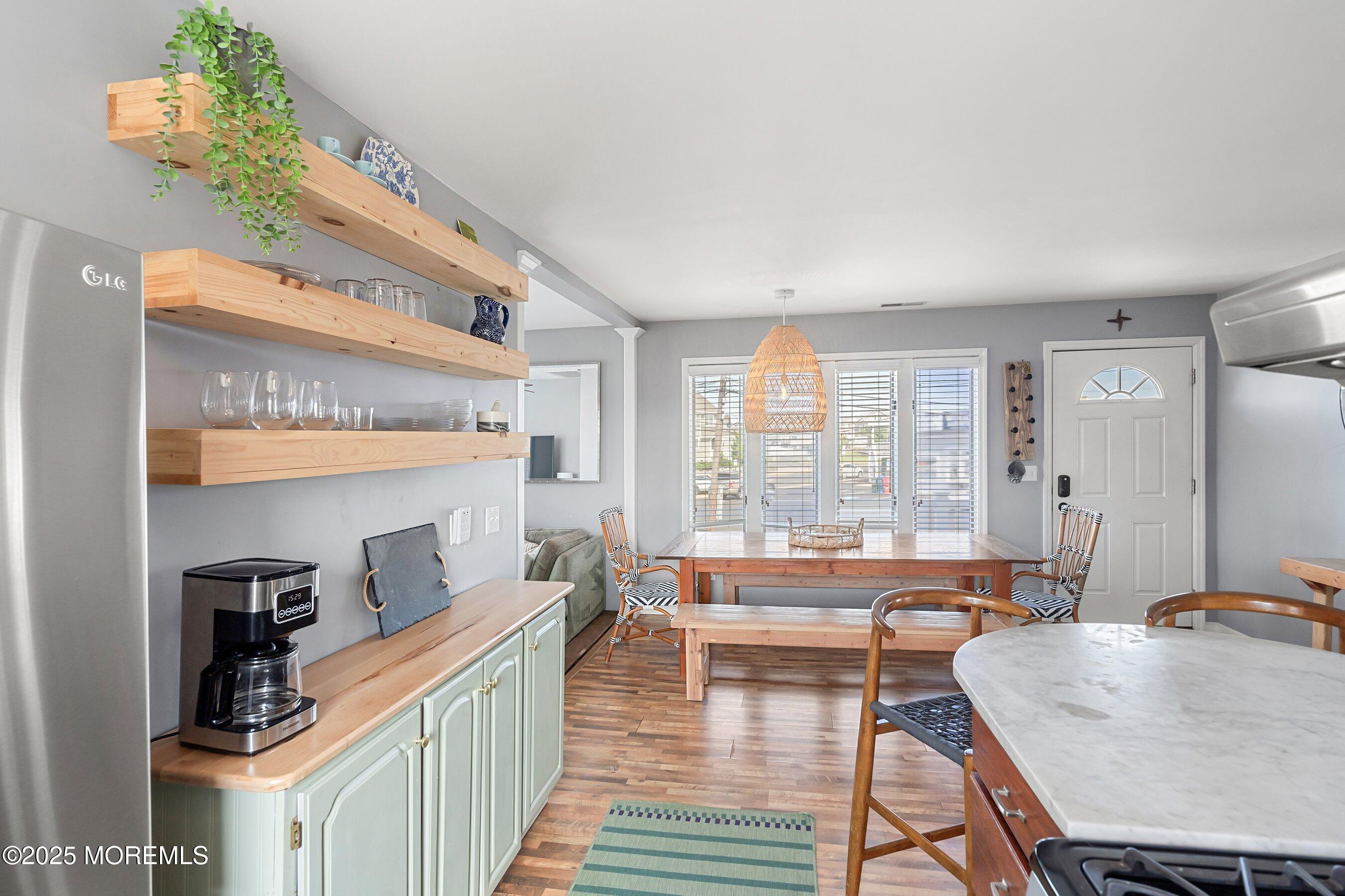 167 4th Avenue Manasquan, NJ 08736 - Photo 8 of 54 a living room with furniture and a large window