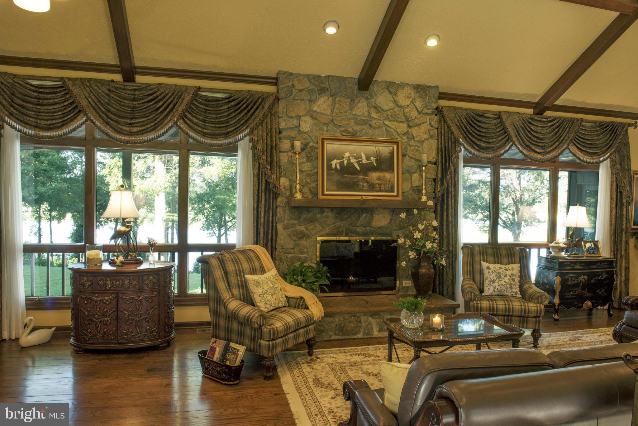 1822 Hatfield Road Huntingtown, MD 20639 - Photo 12 of 27 a view of a livingroom with furniture window and wooden floor