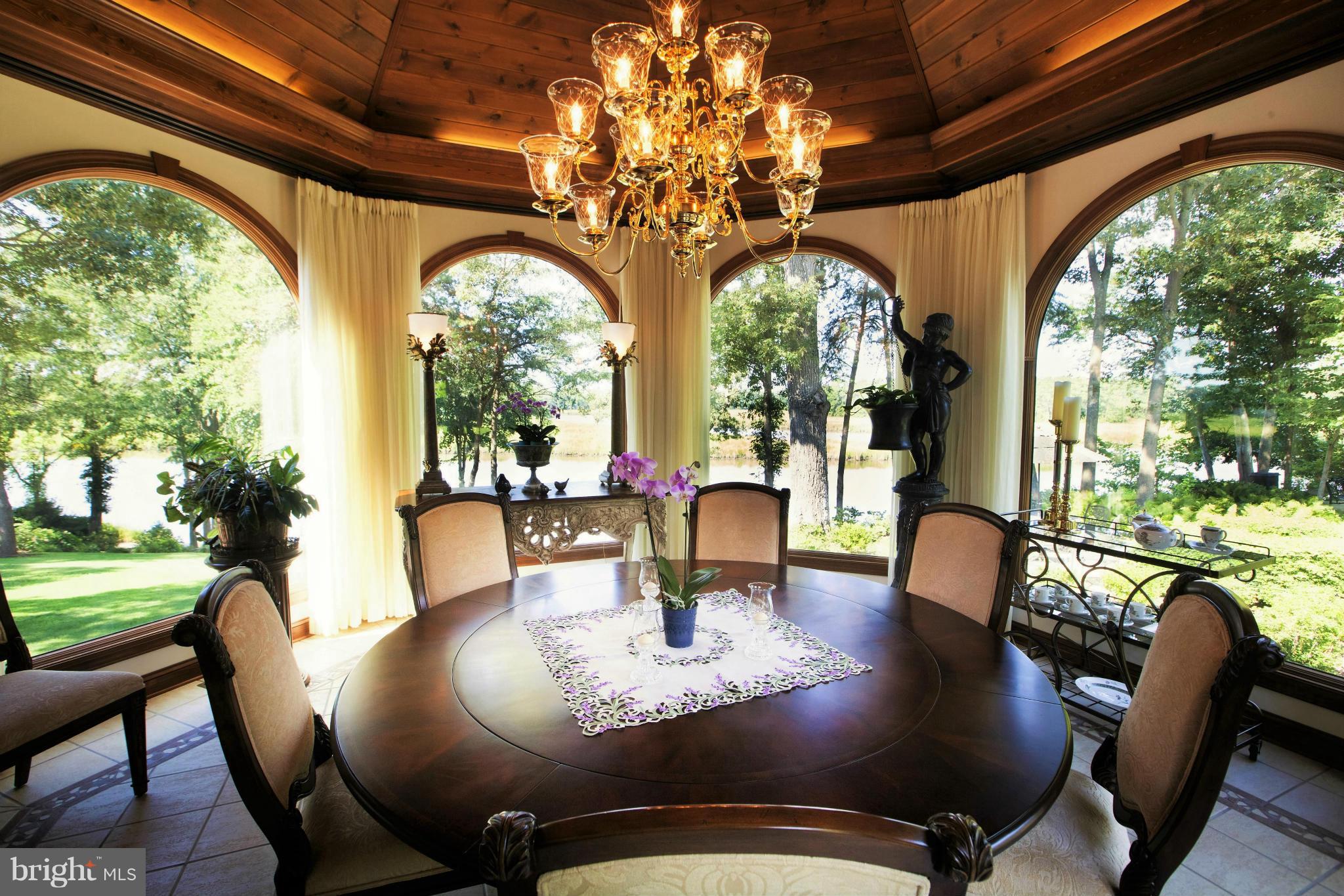 1822 Hatfield Road Huntingtown, MD 20639 - Photo 13 of 27 a view of a dining room with furniture window and outside view