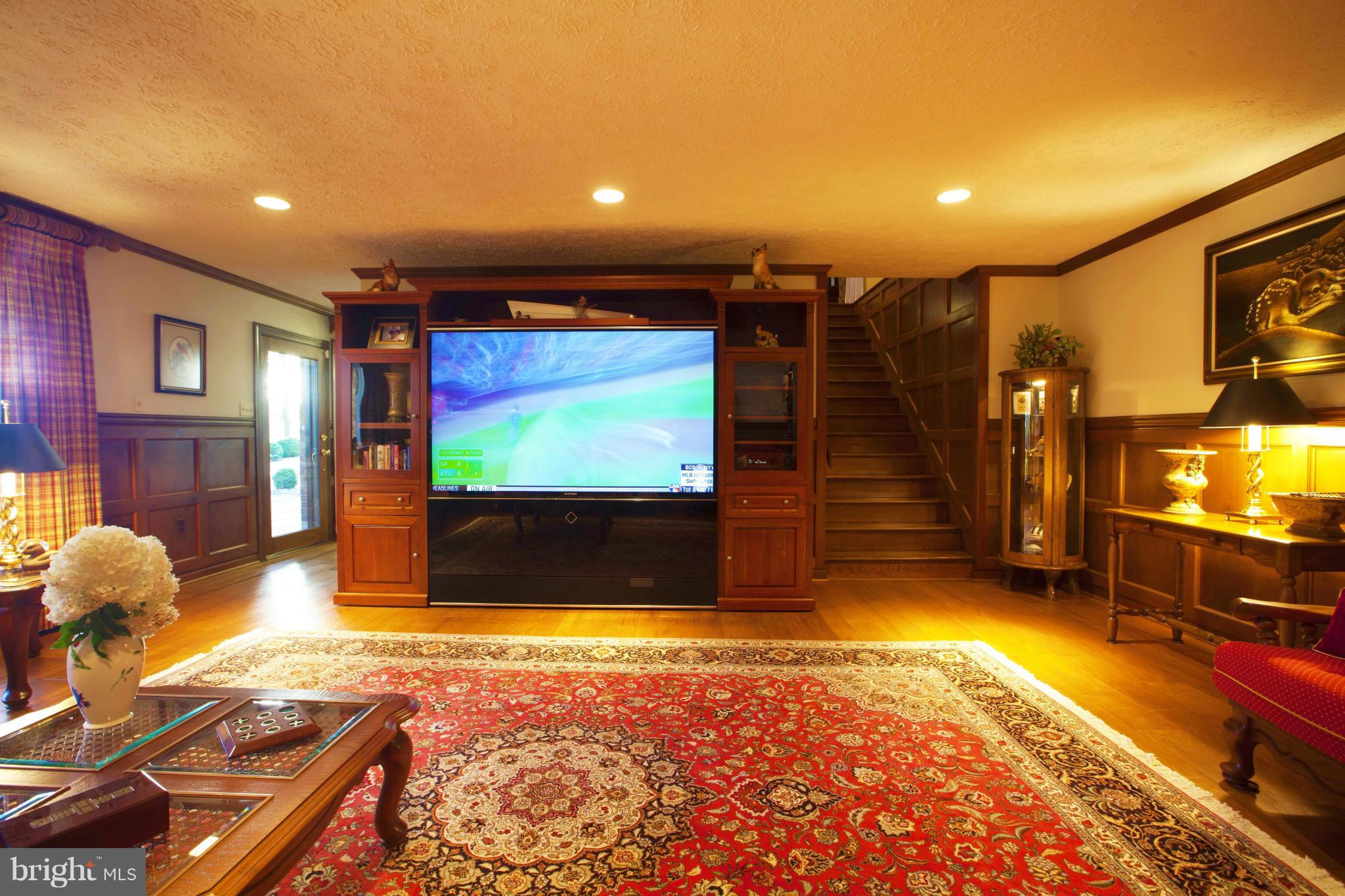 1822 Hatfield Road Huntingtown, MD 20639 - Photo 26 of 27 a view of a projector room with furniture