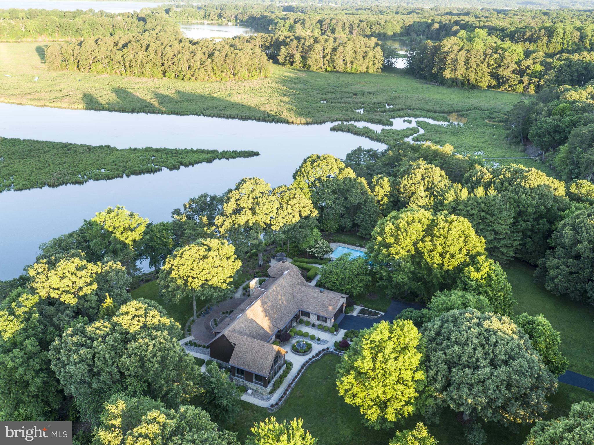 1822 Hatfield Road Huntingtown, MD 20639 - Photo 5 of 27 a view of a lake with houses