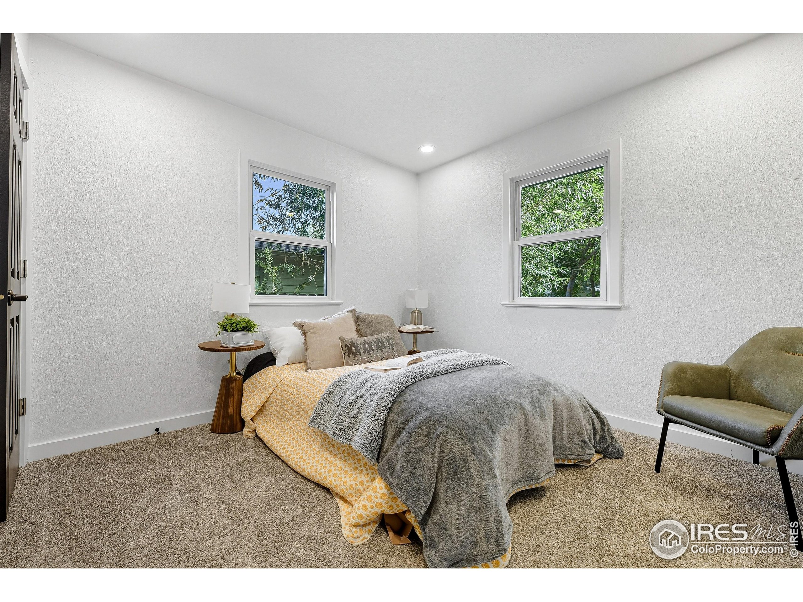 200 Bishop Street Fort Collins, CO 80521 - Photo 17 of 33 a bed room with two bed and a chair