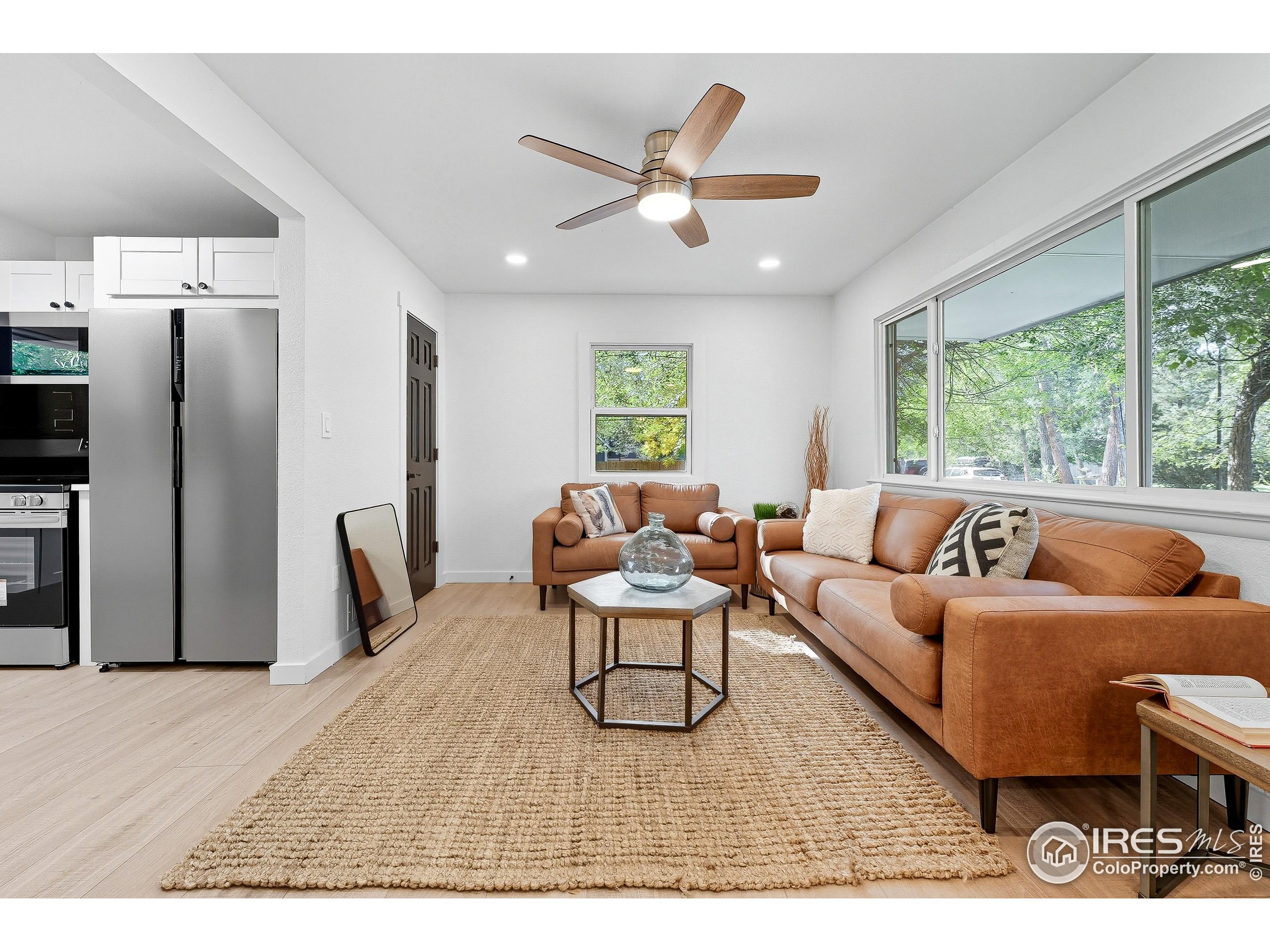 200 Bishop Street Fort Collins, CO 80521 - Photo 7 of 33 a living room with furniture and a large window