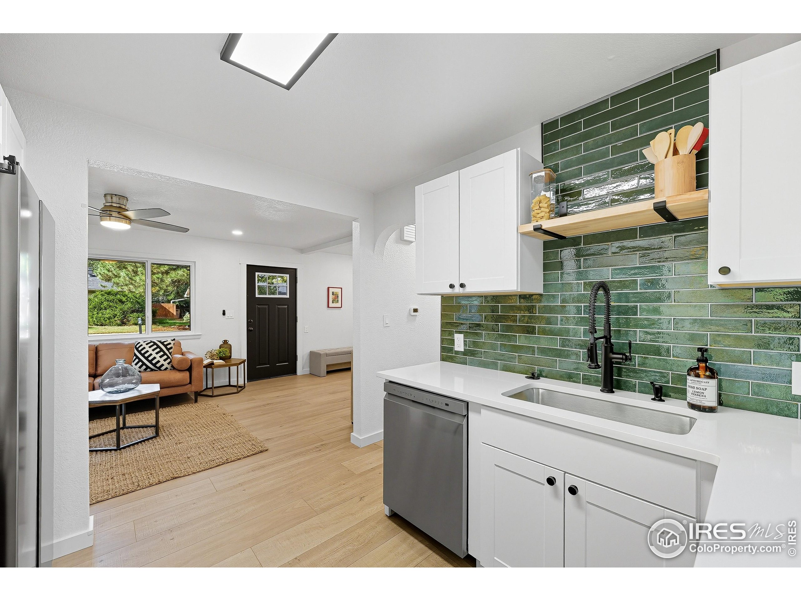 200 Bishop Street Fort Collins, CO 80521 - Photo 10 of 33 a kitchen that has a lot of cabinets in it and wooden floor