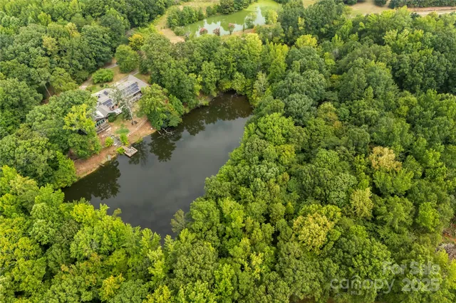 a view of a lake with a house