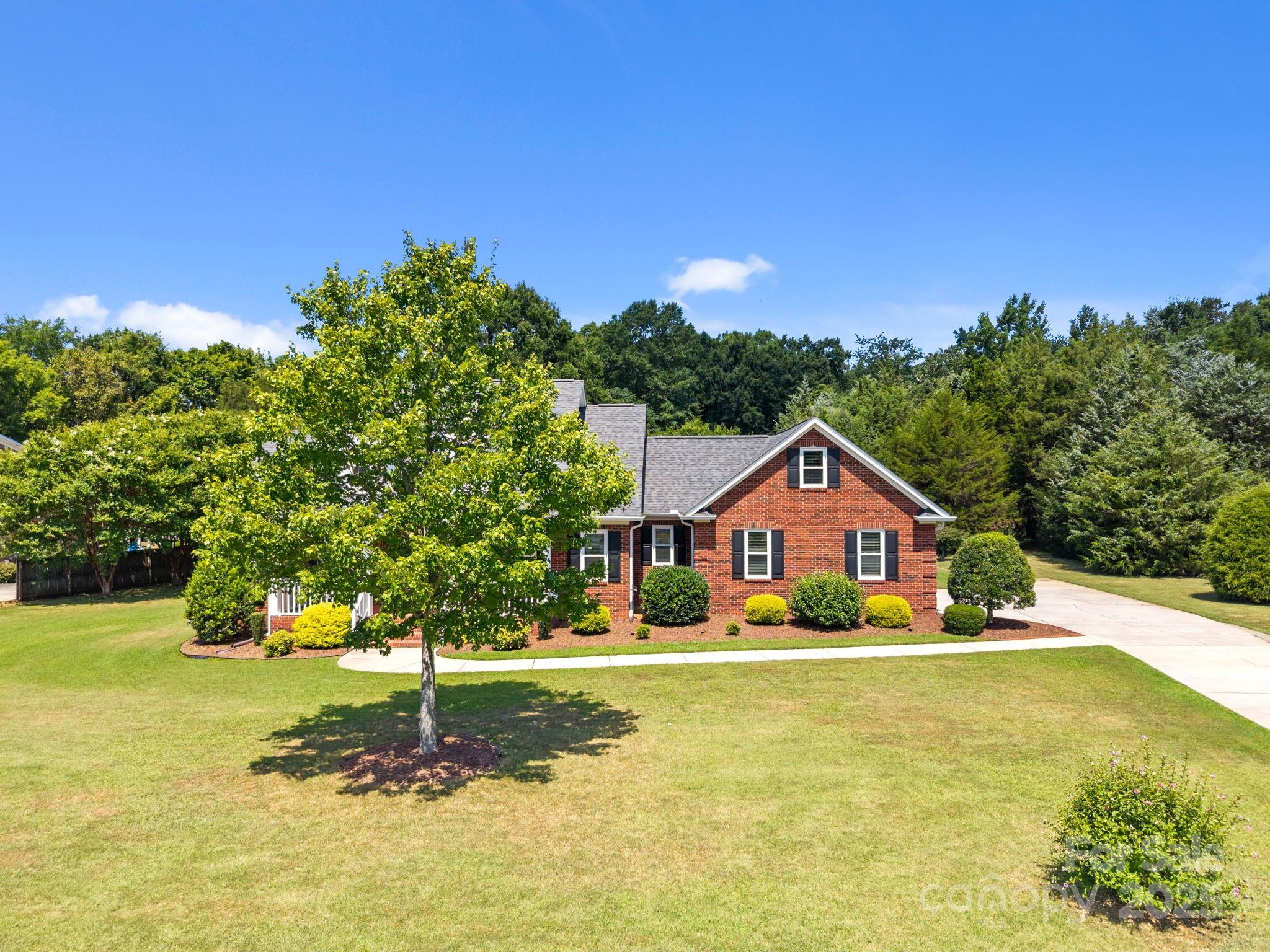 908 Haddonfield Drive Fort Mill, SC 29708 - Photo 3 of 48 a front view of a house with a yard