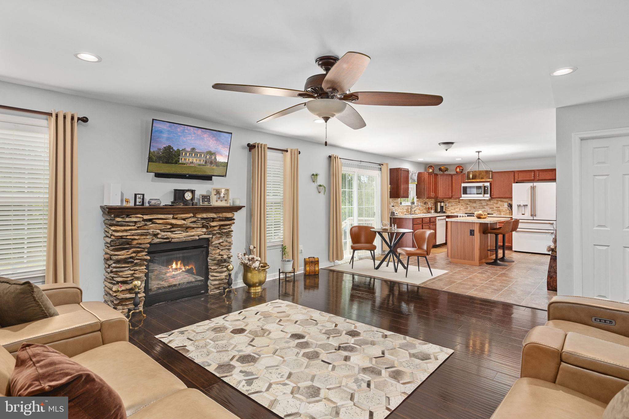 22088 Landora Bridge Road Ruther Glen, VA 22546 - Photo 33 of 122 Cozy living space with modern charm.