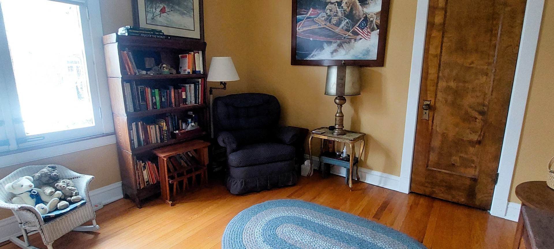 10101 South Hoyne Avenue Chicago, IL 60643 - Photo 13 of 22 a living room with furniture and a book shelf