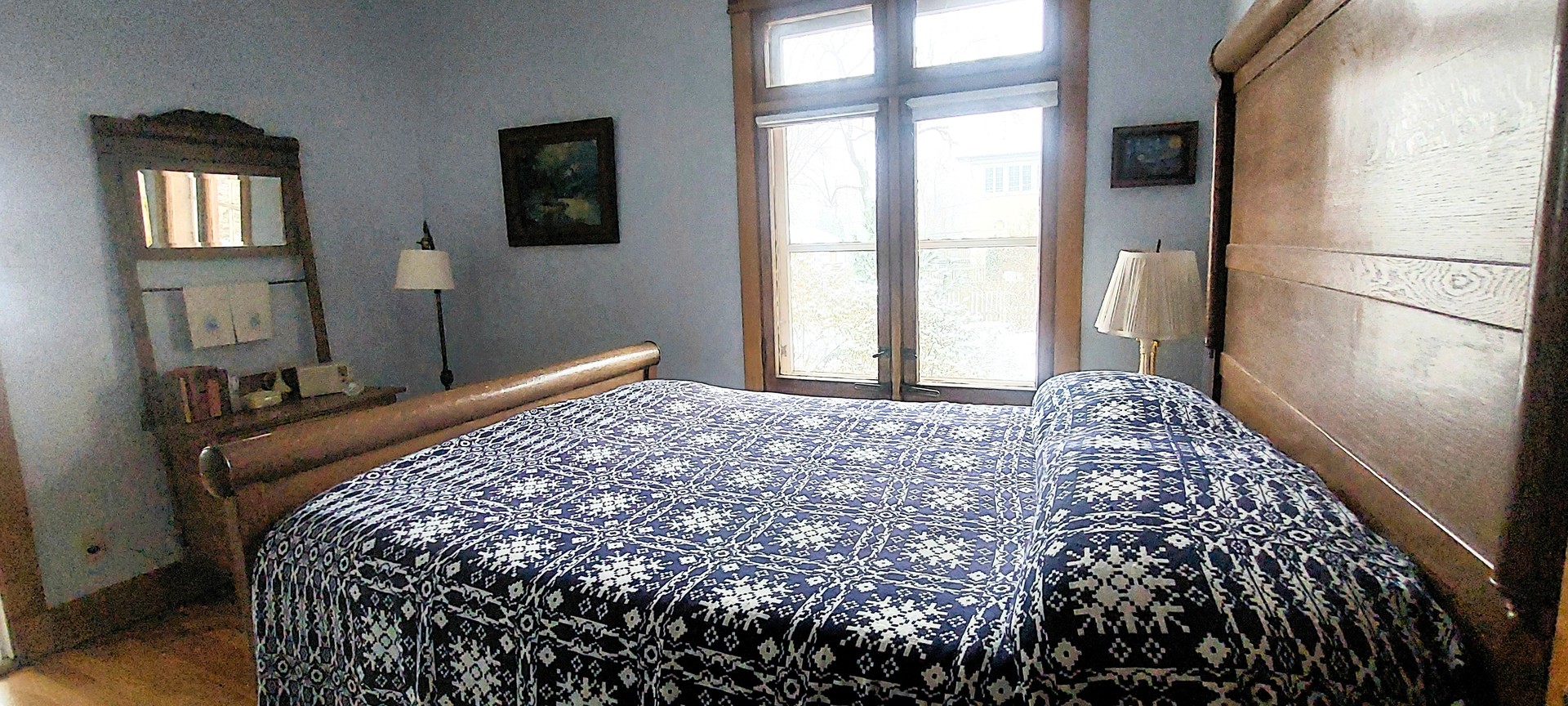 10101 South Hoyne Avenue Chicago, IL 60643 - Photo 15 of 22 a bed sitting in a bedroom next to a window