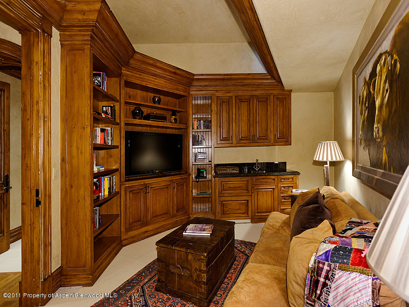 142 Wrights Road Aspen, CO 81612 - Photo 15 of 33 a living room with furniture and a flat screen tv