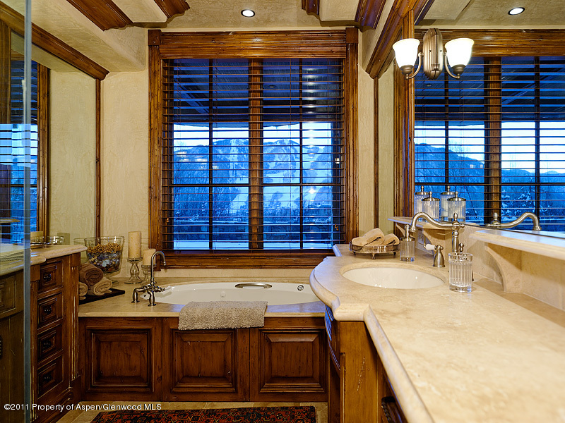 142 Wrights Road Aspen, CO 81612 - Photo 24 of 33 a kitchen with a sink and a stove