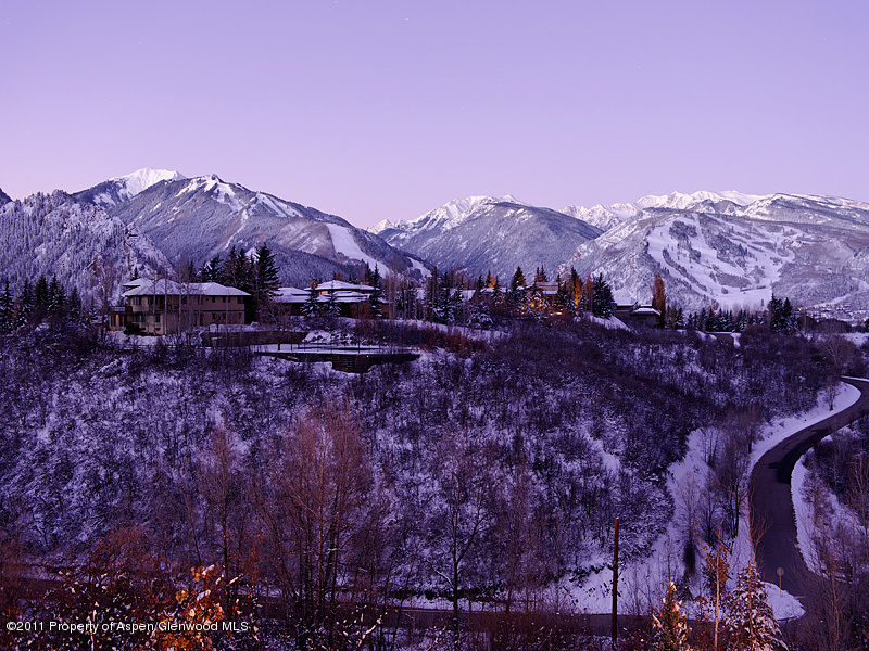142 Wrights Road Aspen, CO 81612 - Photo 32 of 33 a view of a house with a mountain in the background