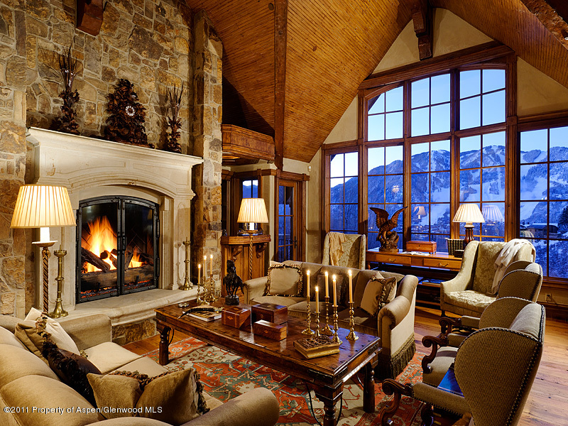 142 Wrights Road Aspen, CO 81612 - Photo 5 of 33 a living room with furniture a fireplace and a floor to ceiling window