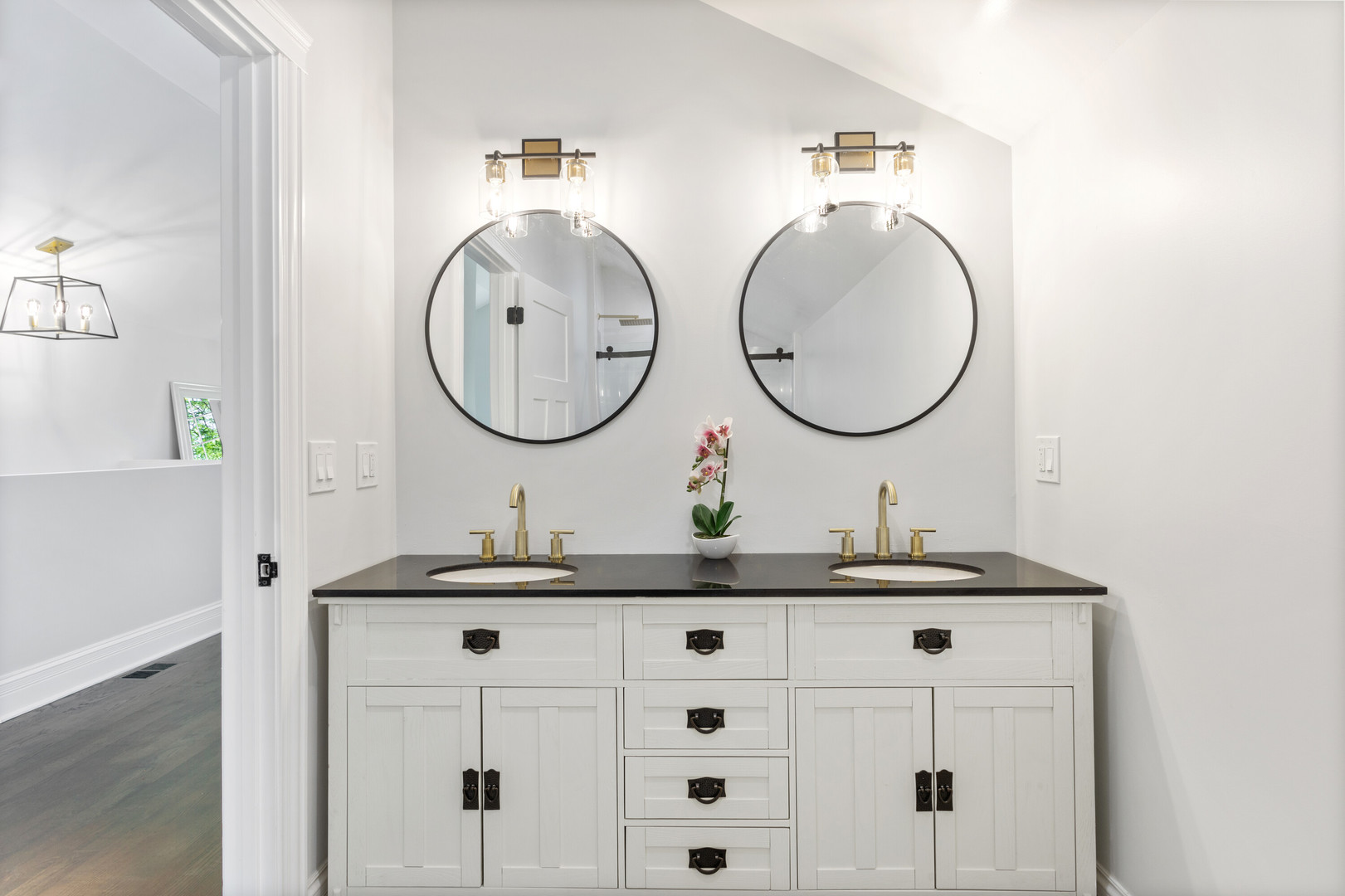 2743 North Ridgeway Avenue Chicago, IL 60647 - Photo 19 of 33 a bathroom with a sink and a mirror