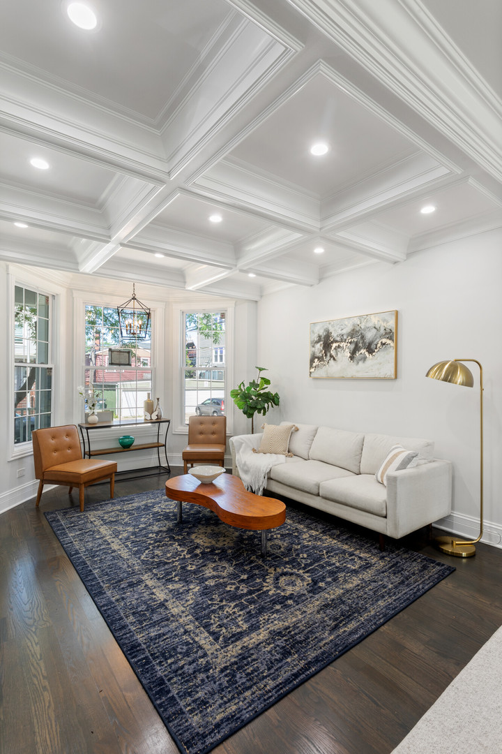 2743 North Ridgeway Avenue Chicago, IL 60647 - Photo 2 of 33 a living room with furniture and a rug