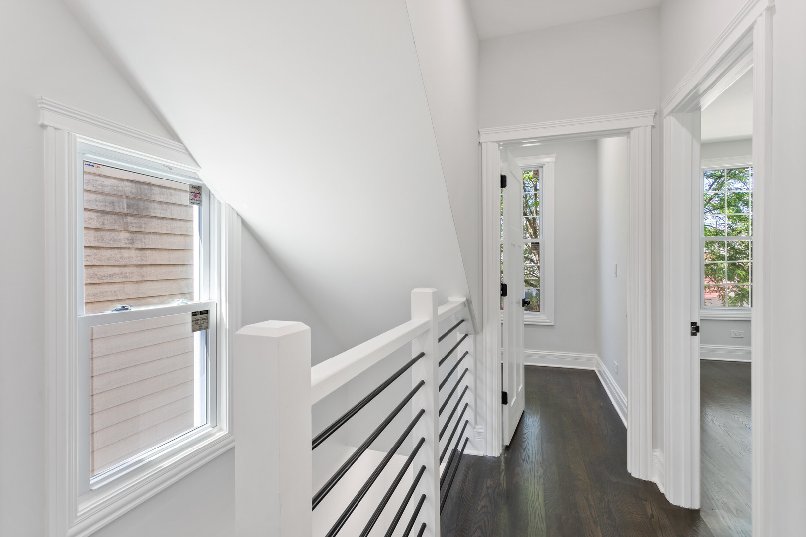 2743 North Ridgeway Avenue Chicago, IL 60647 - Photo 24 of 33 a view of a hallway with wooden floor and staircase