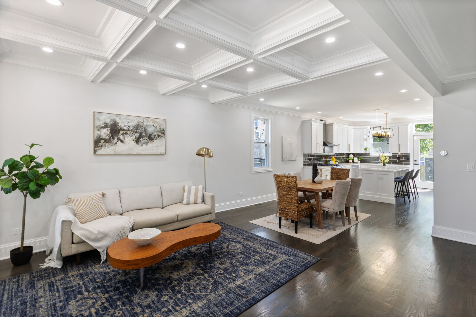 2743 North Ridgeway Avenue Chicago, IL 60647 - Photo 3 of 33 a living room with furniture and a dining table with wooden floor