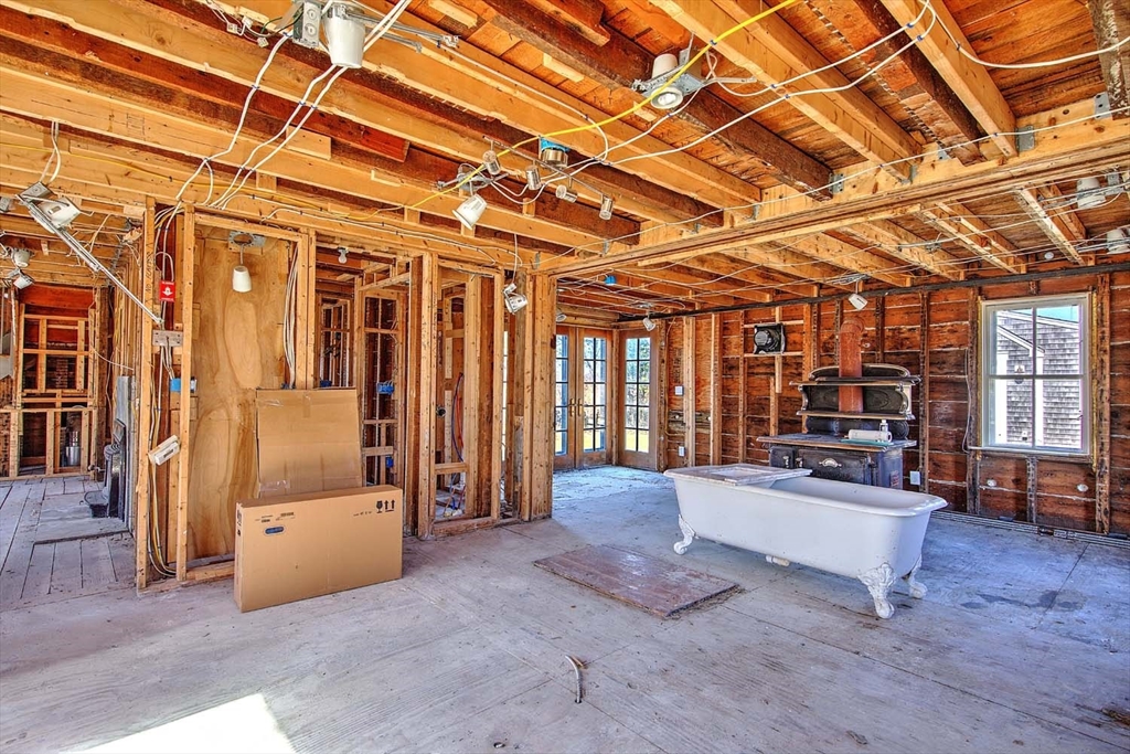 408 Hixbridge Road Westport, MA 02790 - Photo 11 of 35 a view of a livingroom with furniture wooden floor and windows