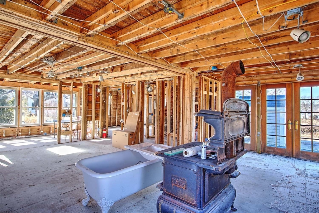 408 Hixbridge Road Westport, MA 02790 - Photo 12 of 35 a living room with furniture and a flat screen tv