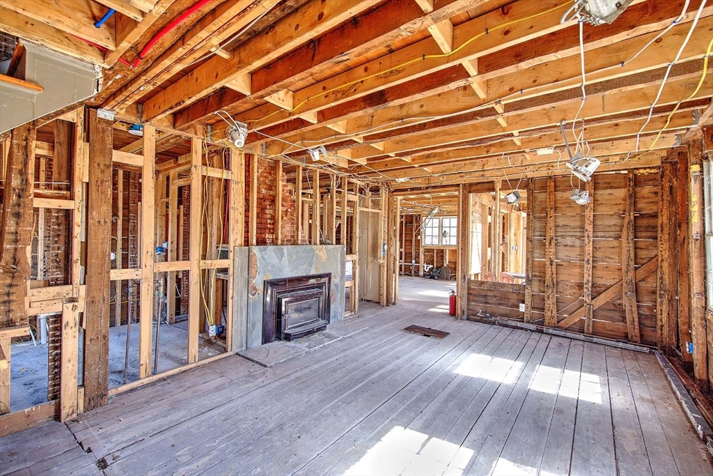 408 Hixbridge Road Westport, MA 02790 - Photo 14 of 35 a view of empty room with wooden floor and fan