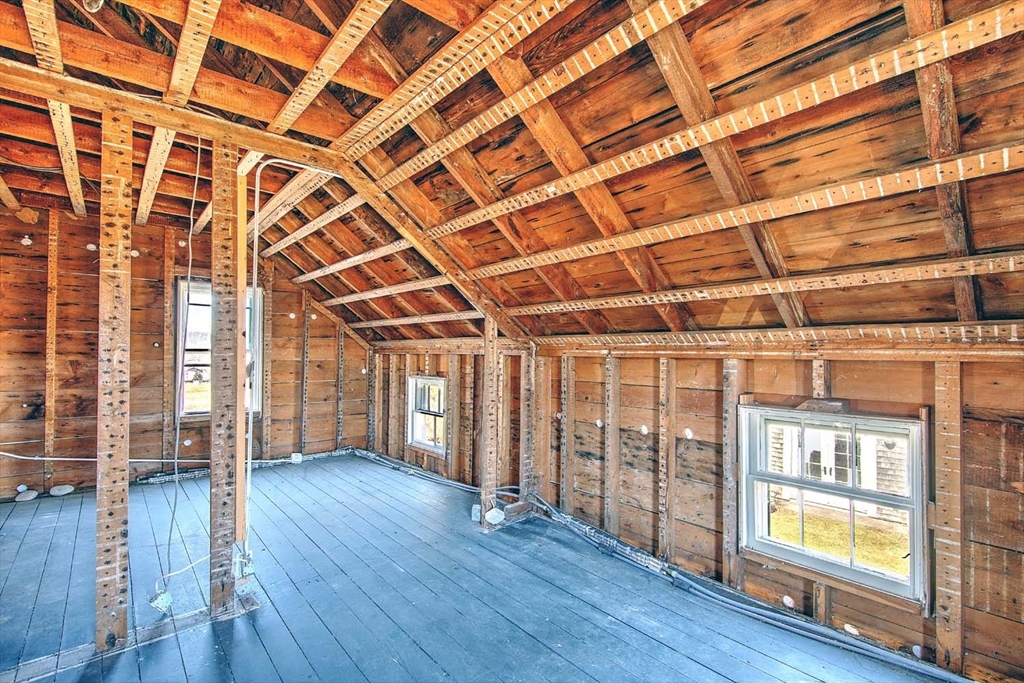 408 Hixbridge Road Westport, MA 02790 - Photo 20 of 35 a view of an empty room with wooden floor and a window
