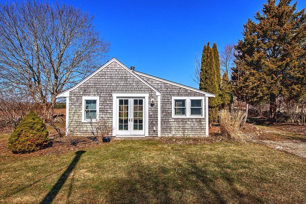 408 Hixbridge Road Westport, MA 02790 - Photo 22 of 35 a front view of a house with a garden